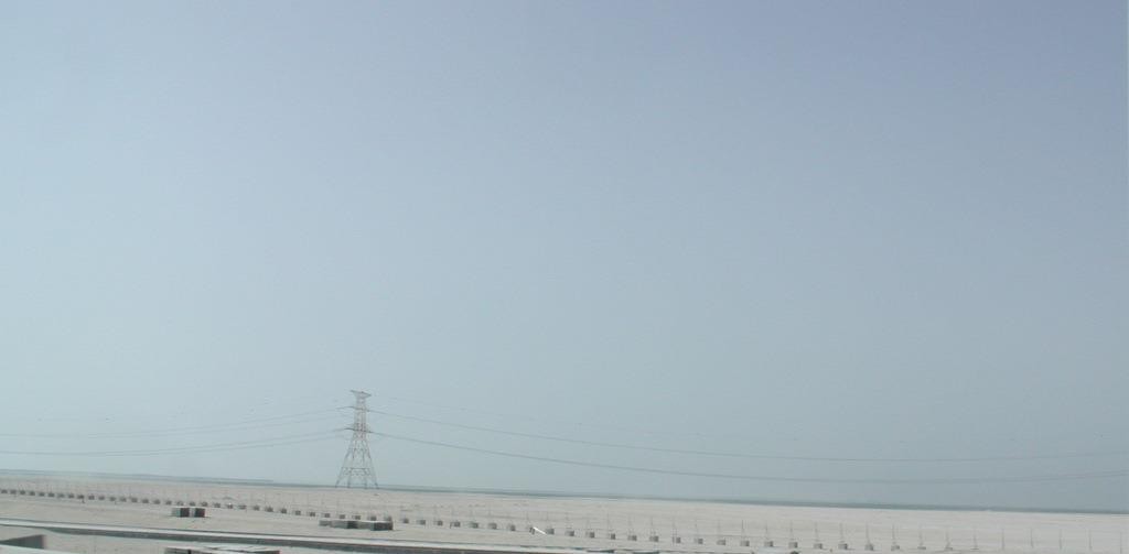 Between Al Reef and Abu Dhabi city