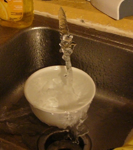 Winter is a challenge with rural life in the Ozarks. Even when I do leave the water on, sometimes it's not enough. Stalagmites in the sink one cold winter morning.