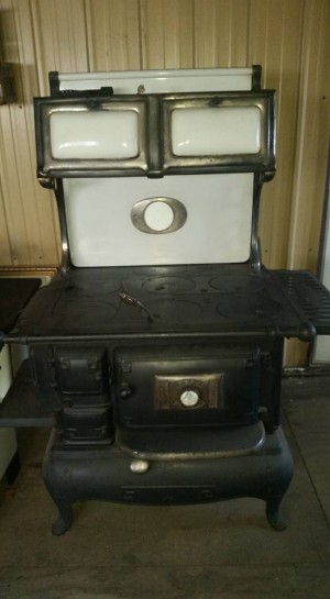 I'll be putting things on the back burner for real with our new/old wood or coal cook stove.