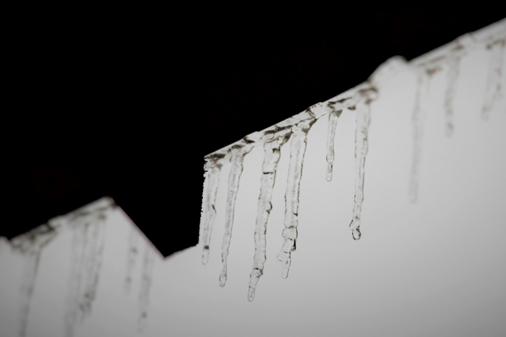 Ice sliding from the roof is a distinct sound of winter.