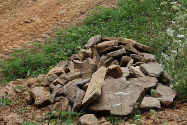 The rock pile for culvert retaining wall.