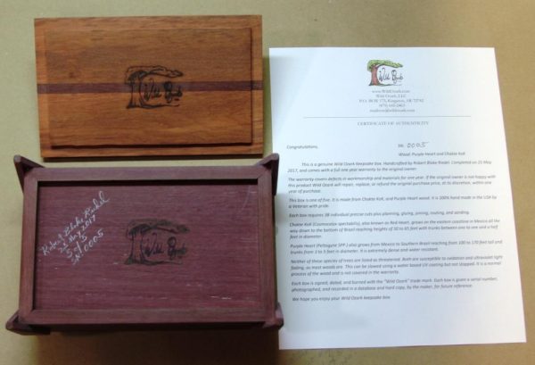 Box and certificate, signed and numbered.