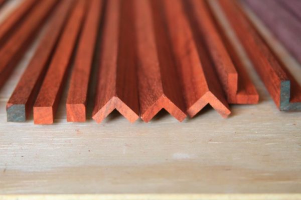 Angles and squares in the woodworking shop ready to cut to size and shape.