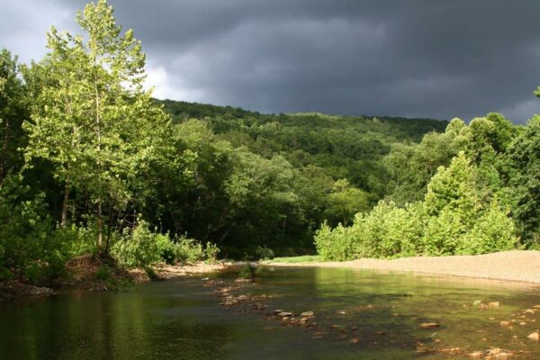 Rain's a'coming. Kings River with stormclouds and backlighting.