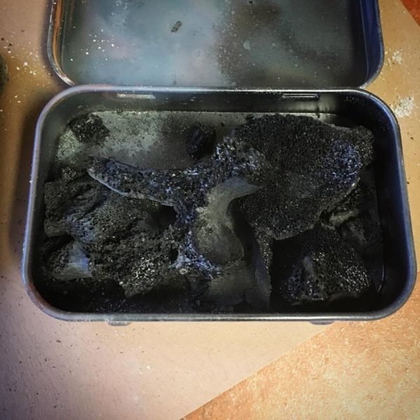 Charred bone, for making bone black watercolor paint.