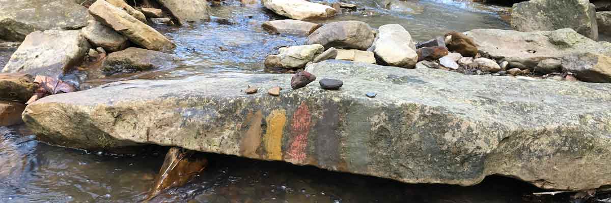 Getting over my video fear. Image is a rock in the creek with pigment scrapes on the front.