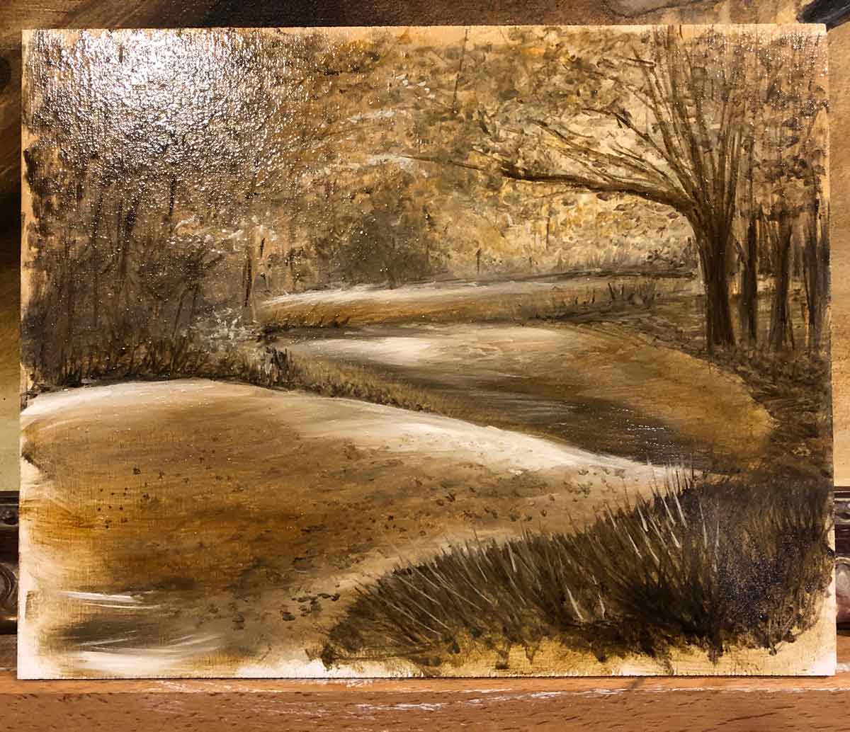A painting in progress of the Choo Choo trail in Bentonville, AR.